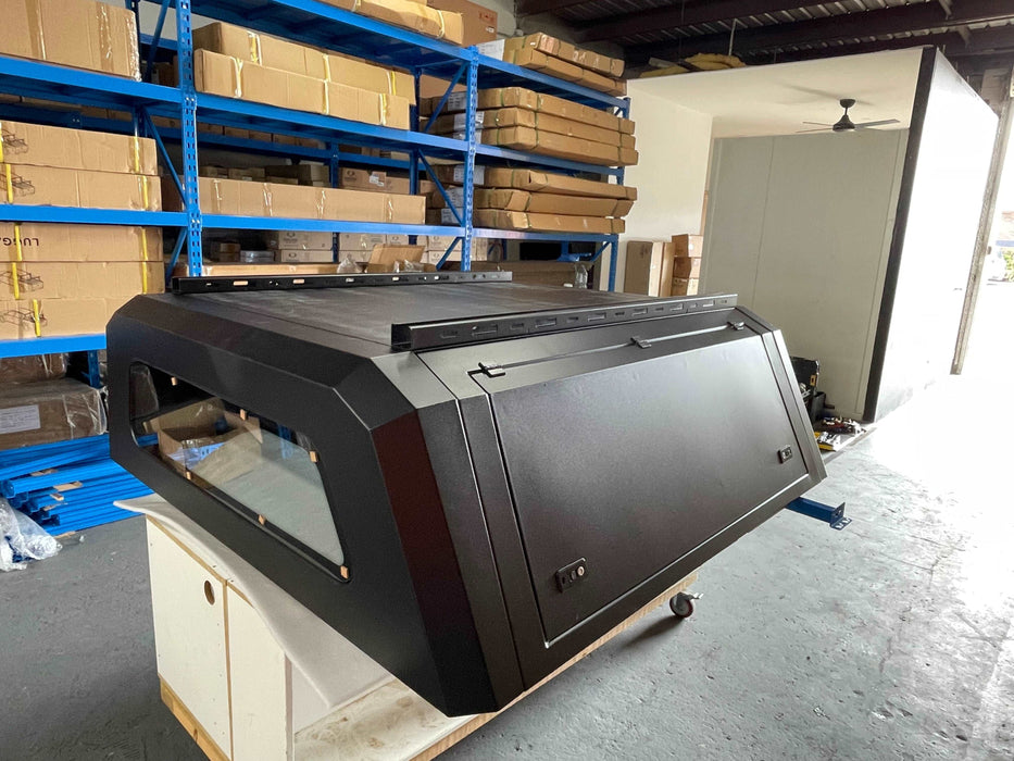 our new Steel Canopy is a top-tier choice among Ssangyong Musso accessories. Custom-made for the Ssangyong Musso, this canopy promises to facilitate better cargo management and improve your utility needs.