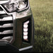 Introducing the Genuine Ssangyong LED Fog Lights Kit for Musso. This 100% authentic set, designed specifically for the facelift Musso (2021-Present), includes LH/RH fog lights, surrounds, and an optional wiring harness to suit LED jacks. Please note that installation may require modification to the wiring jack or a complete swap of the front bumper's wiring harness. Choose quality and reliability with our genuine product for enhanced visibility and safety.