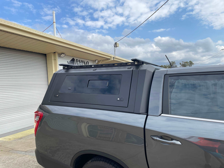 our new Aluminium Canopy with Window is a top-tier choice among Ssangyong Musso accessories. Custom-made for the Ssangyong Musso, this canopy promises to facilitate better cargo management and improve your utility needs.