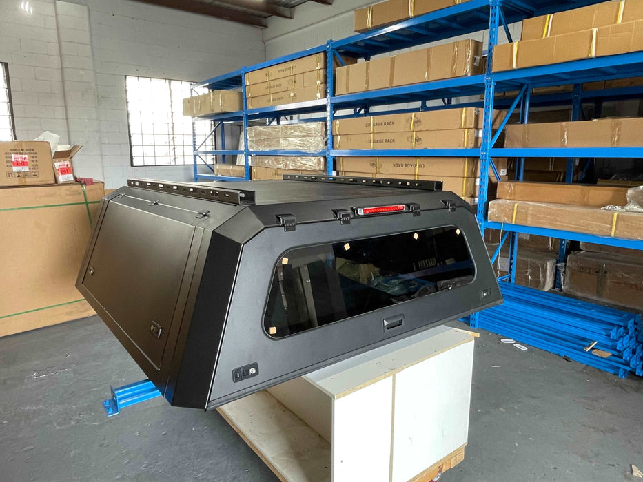 our new Steel Canopy is a top-tier choice among Ssangyong Musso accessories. Custom-made for the Ssangyong Musso, this canopy promises to facilitate better cargo management and improve your utility needs. 