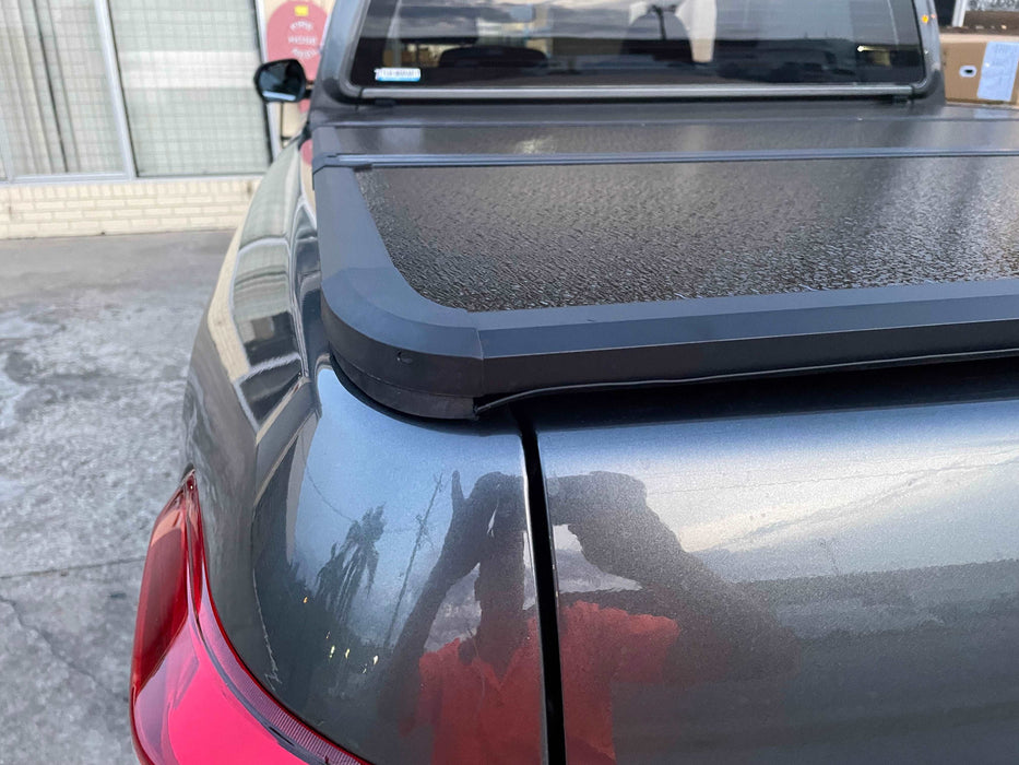 Hard Tri-fold Tonneau Cover, exclusively designed for your Ssangyong Musso. promising to facilitate better cargo management and improve your utility needs.