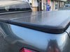 Hard Tri-fold Tonneau Cover, exclusively designed for your Ssangyong Musso. promising to facilitate better cargo management and improve your utility needs.